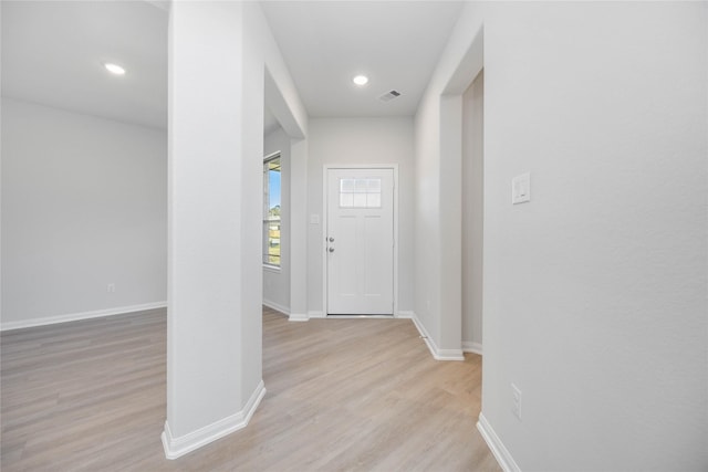 foyer entrance featuring light hardwood / wood-style flooring