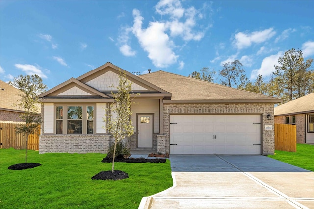 view of front of house with a front lawn and a garage