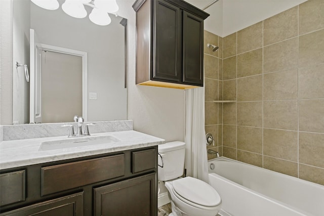 full bath featuring bathing tub / shower combination, vanity, and toilet