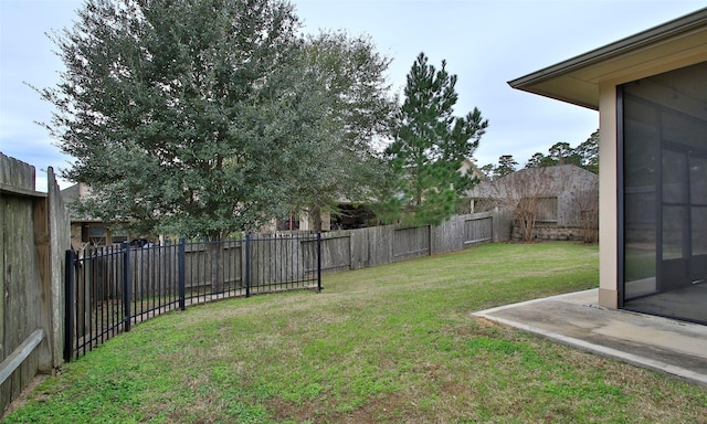 view of yard featuring a fenced backyard