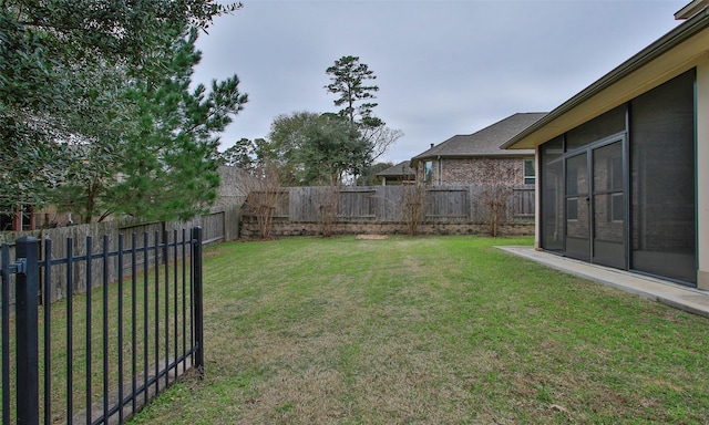 view of yard featuring a fenced backyard