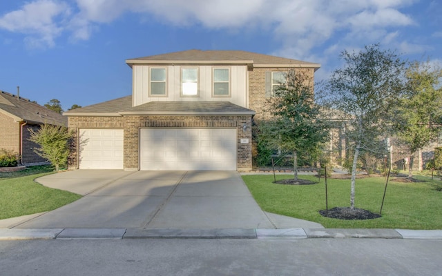 view of front facade featuring a front yard and a garage