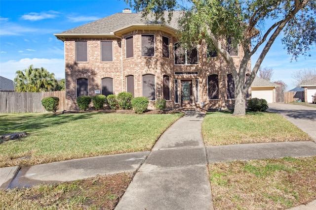 view of front facade featuring a front yard