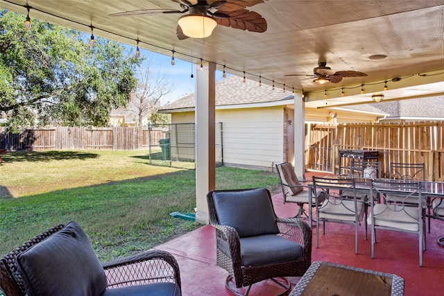 view of patio / terrace featuring ceiling fan