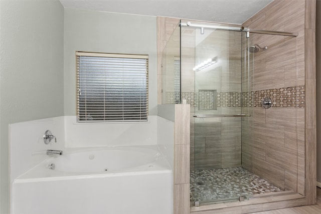 bathroom with independent shower and bath