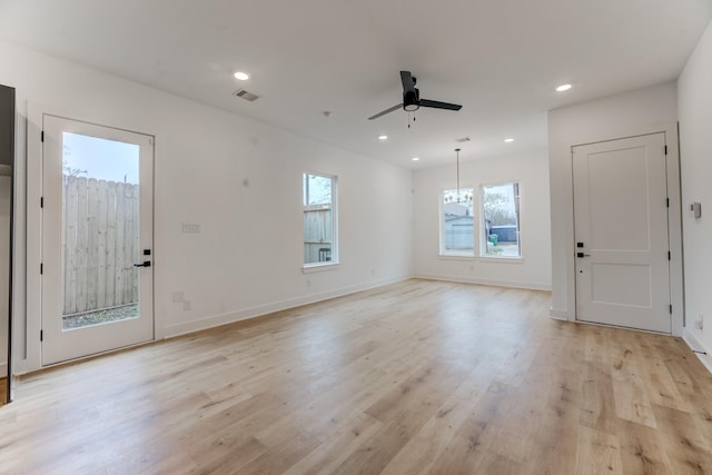 interior space featuring ceiling fan and light wood-type flooring