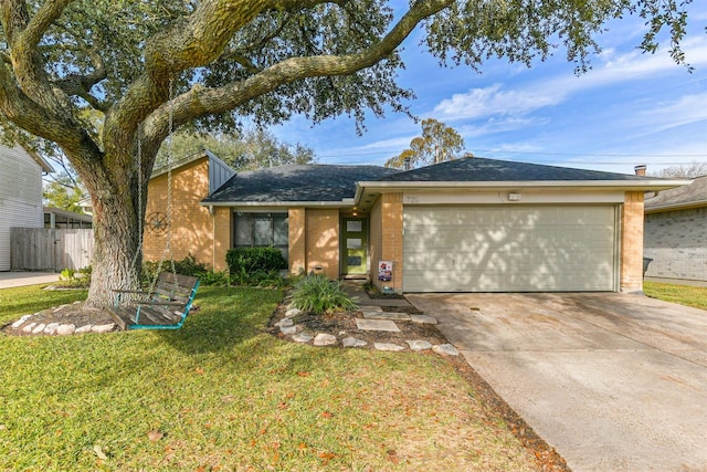 ranch-style house with a front yard and a garage