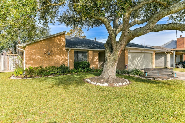 ranch-style house with a garage and a front lawn