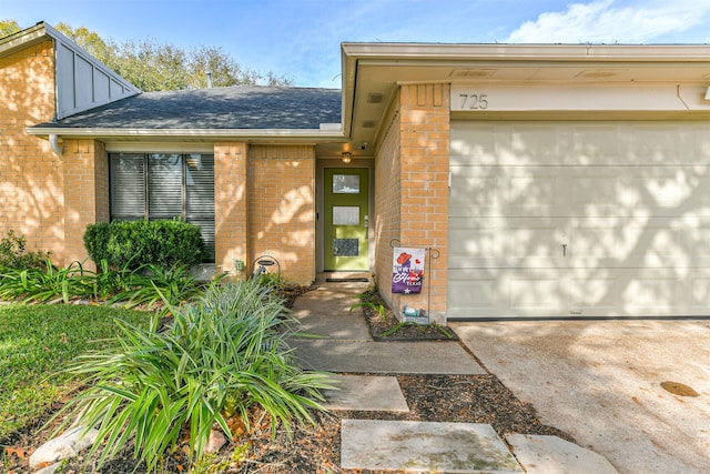 entrance to property featuring a garage