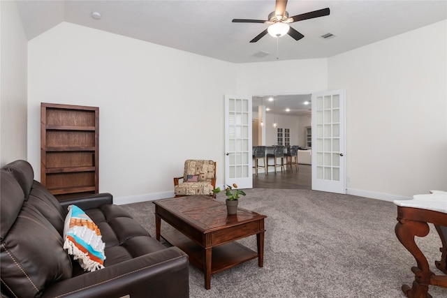 carpeted living room featuring ceiling fan and french doors