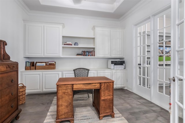 office space featuring plenty of natural light, ornamental molding, french doors, and a tray ceiling