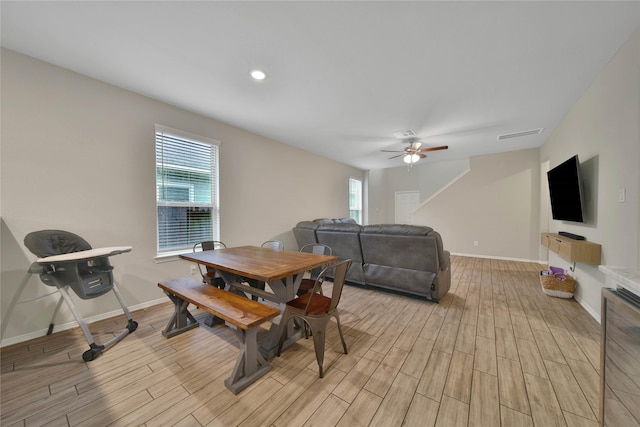 24715 Winema Woods Ln, Huffman, TX 77336 - dining space with visible vents, light wood-style flooring, baseboards, and ceiling fan