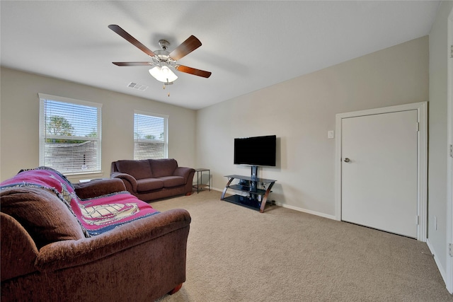 24715 Winema Woods Ln, Huffman, TX 77336 - living area featuring a ceiling fan, visible vents, carpet floors, and baseboards