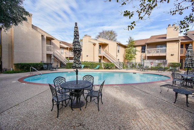 view of pool featuring a patio