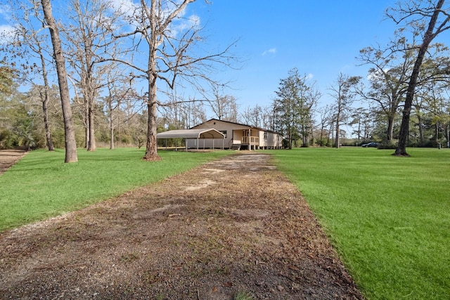 view of yard featuring a carport