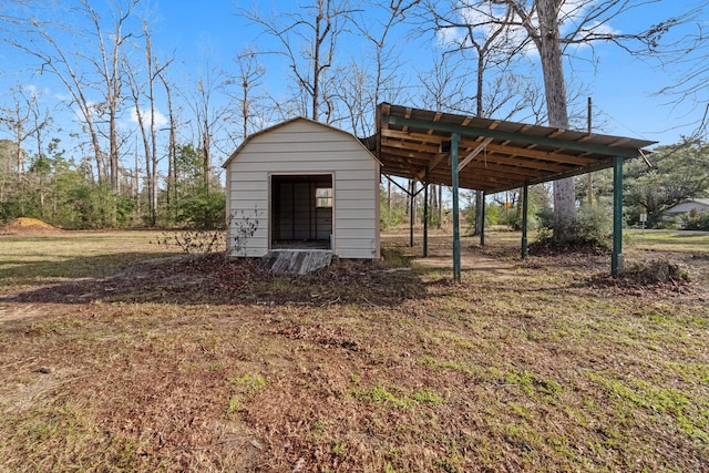 view of outdoor structure featuring a lawn