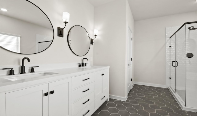 bathroom featuring tile patterned floors, walk in shower, and vanity