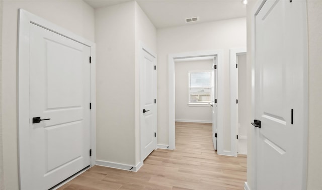 hall featuring light wood-type flooring