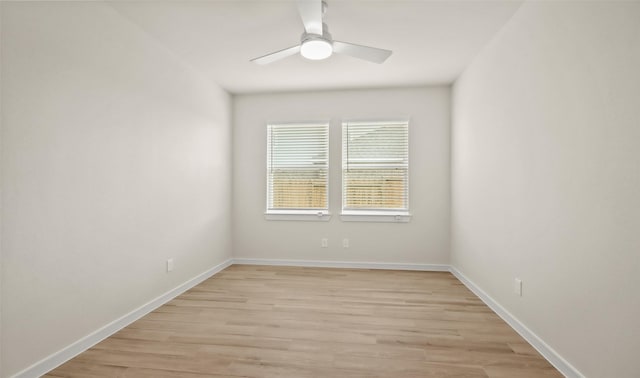 unfurnished room with ceiling fan and light hardwood / wood-style floors