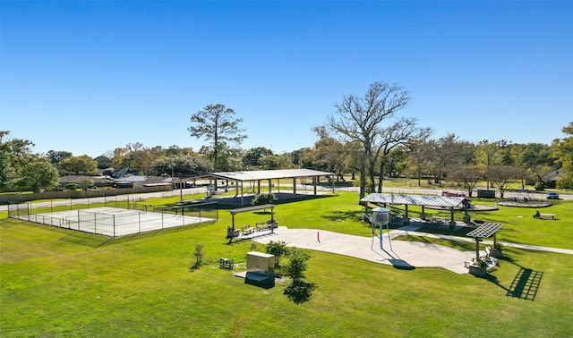 view of home's community featuring a lawn