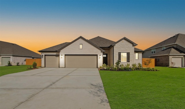 view of front of house with a yard