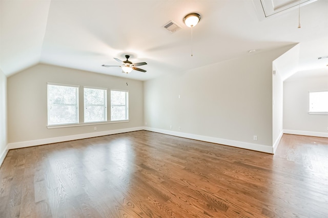 interior space featuring ceiling fan, lofted ceiling, and hardwood / wood-style flooring