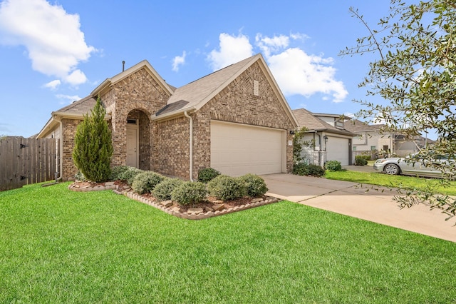 view of front of house featuring brick siding, a front lawn, fence, concrete driveway, and a garage