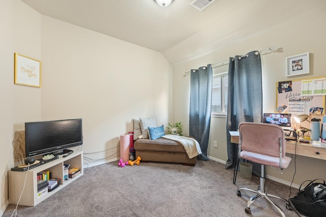 bedroom featuring lofted ceiling and carpet flooring