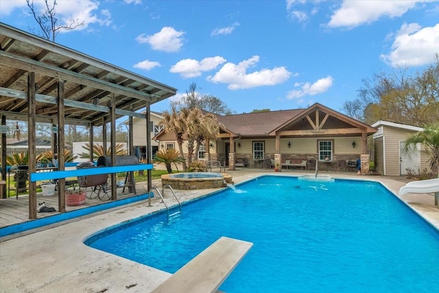 view of pool with a storage shed, a water slide, an in ground hot tub, a diving board, and a patio