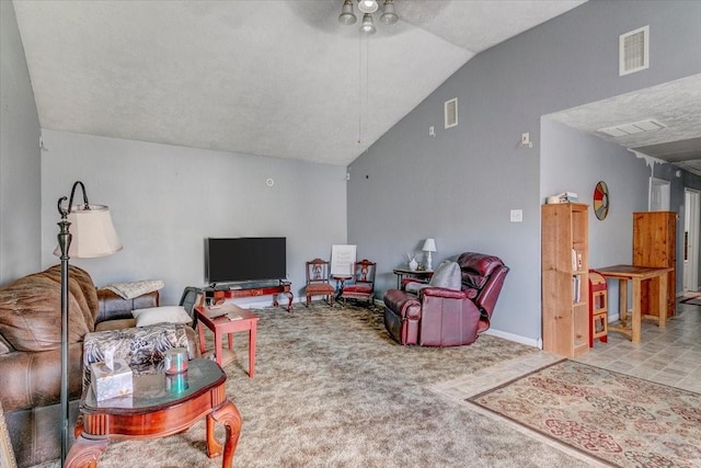 carpeted living room featuring vaulted ceiling, ceiling fan, and a textured ceiling