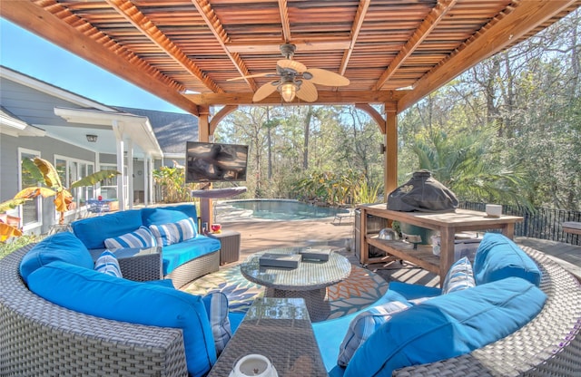 view of patio / terrace with ceiling fan and an outdoor hangout area