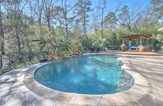 view of swimming pool with a gazebo and a patio