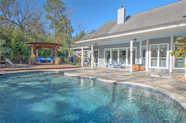 view of pool featuring a pergola and a patio area