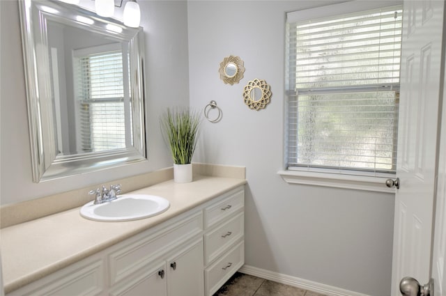 bathroom featuring tile patterned floors and vanity