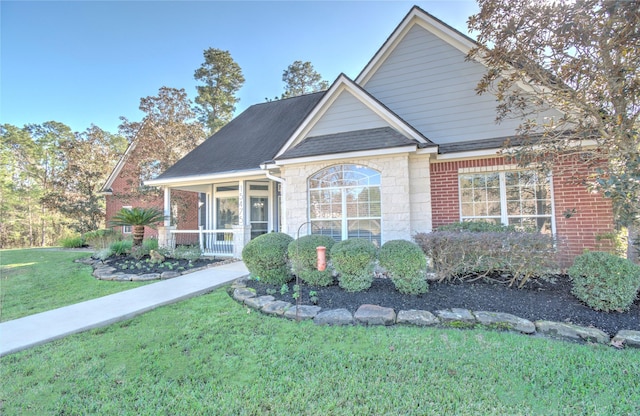 view of front of home with a front lawn