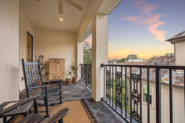 balcony at dusk with ceiling fan