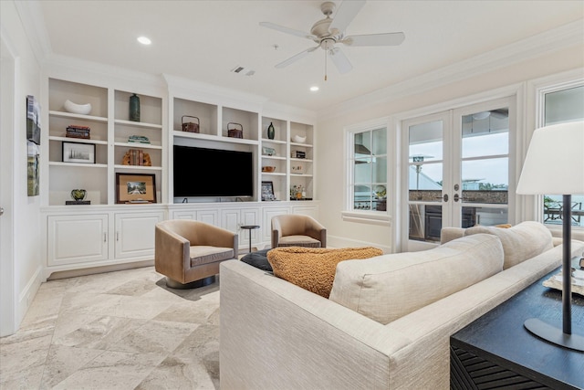 living room featuring ceiling fan, built in features, ornamental molding, and french doors