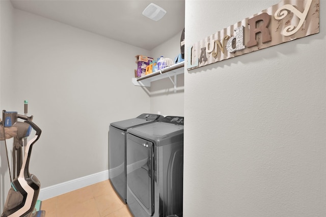 laundry room featuring washer and clothes dryer