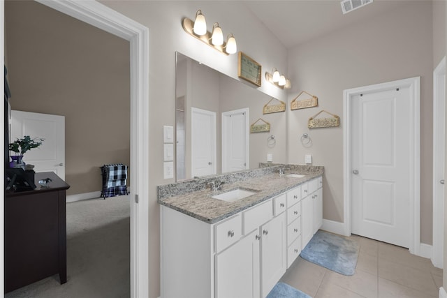 bathroom featuring vanity and tile patterned floors