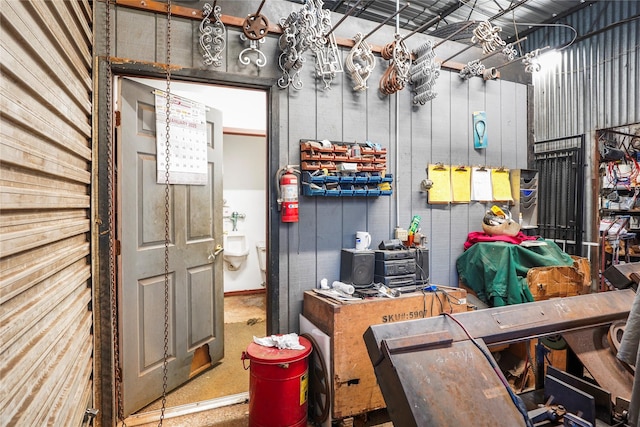 interior space featuring wood walls