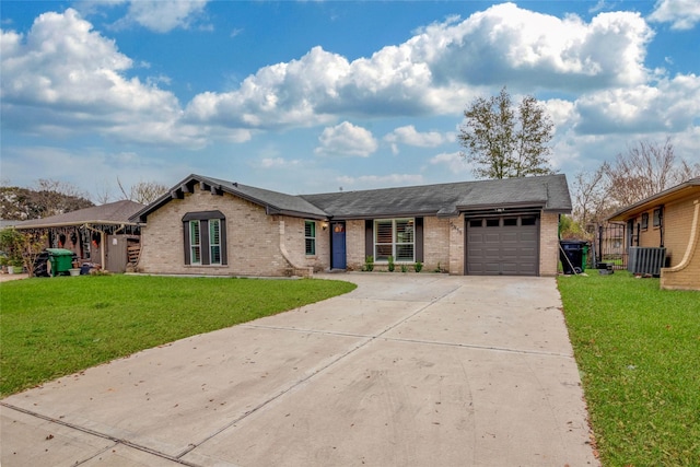 single story home featuring a front yard and a garage