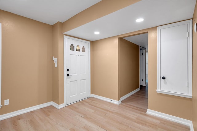 entrance foyer with light hardwood / wood-style floors