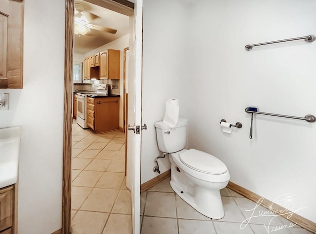 bathroom with toilet, ceiling fan, and tile patterned floors