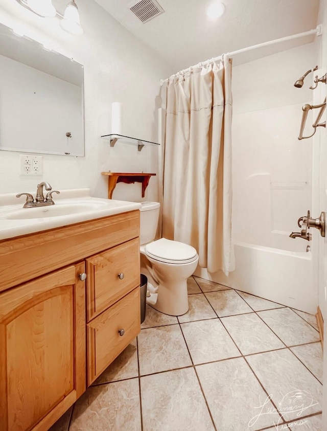 full bathroom with toilet, tile patterned flooring, shower / tub combo, and vanity