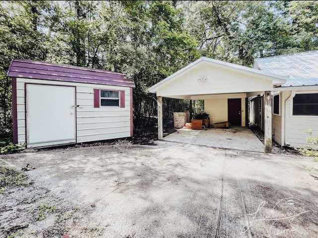 garage featuring a carport