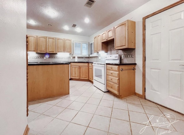 kitchen with light tile patterned floors, decorative backsplash, electric range, light brown cabinetry, and a textured ceiling