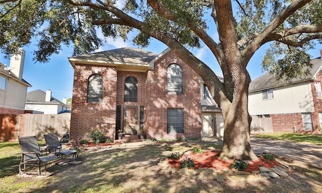 view of front of property with a front lawn