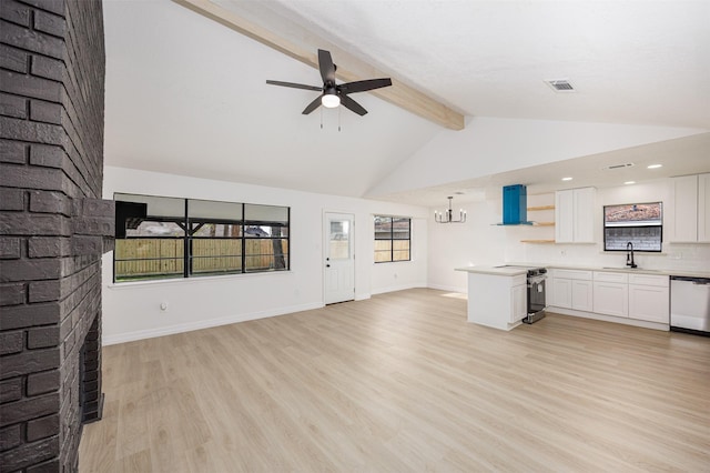 unfurnished living room featuring ceiling fan with notable chandelier, sink, light hardwood / wood-style flooring, and vaulted ceiling with beams