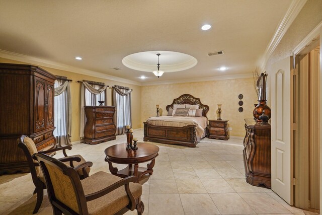 bedroom with light tile patterned floors, a tray ceiling, and crown molding