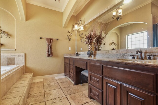 bathroom with tiled bath, vanity, ornamental molding, and a notable chandelier